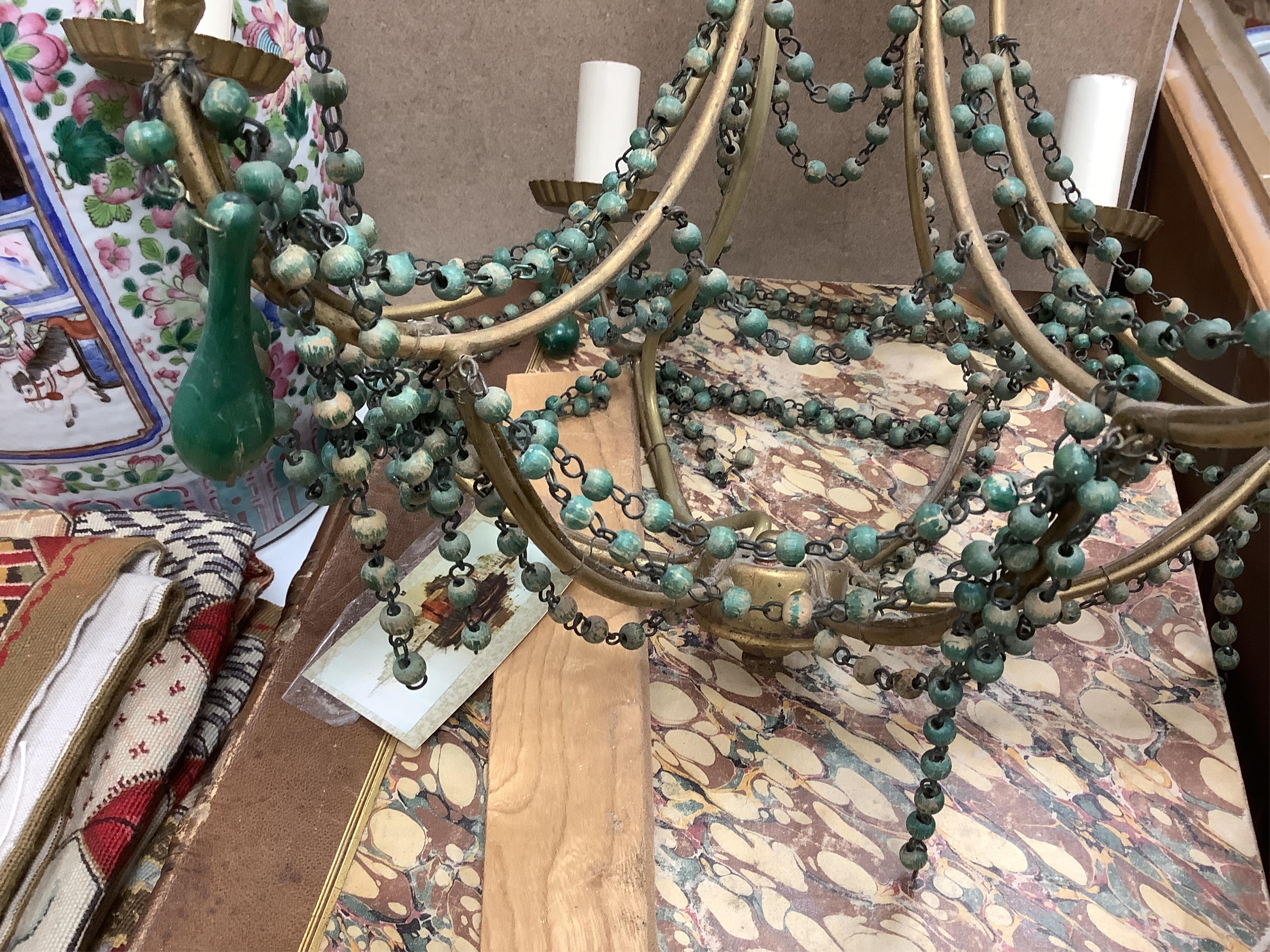 A beaded and gilt metal six branch electrolier, 86cm high